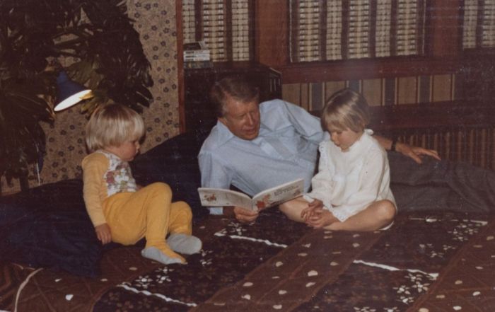 President Jimmy Carter stayed with the Olson family of Northeast Portland when he visited in 1978 and read a book to the Olsons' two children, Ehren, left, and Kristen. Janet Olson was pregnant with her third child at the time of the visit. Beth Nakamura / The Oregonian